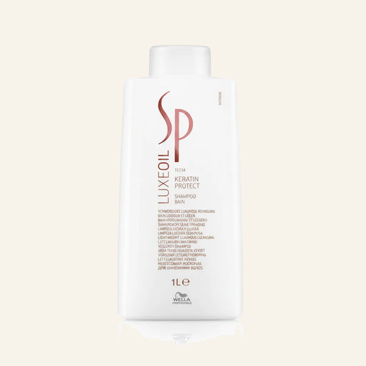 Luxe-Öl Shampoo & Keratinschutz für Geschmeidigkeit & Glanz - Produktfoto auf beigem Hintergrund