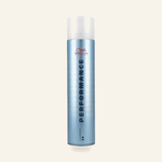 Performance Extra Strong Wella 500 ml Haar Spray - Produktfoto auf beigem Hintergrund