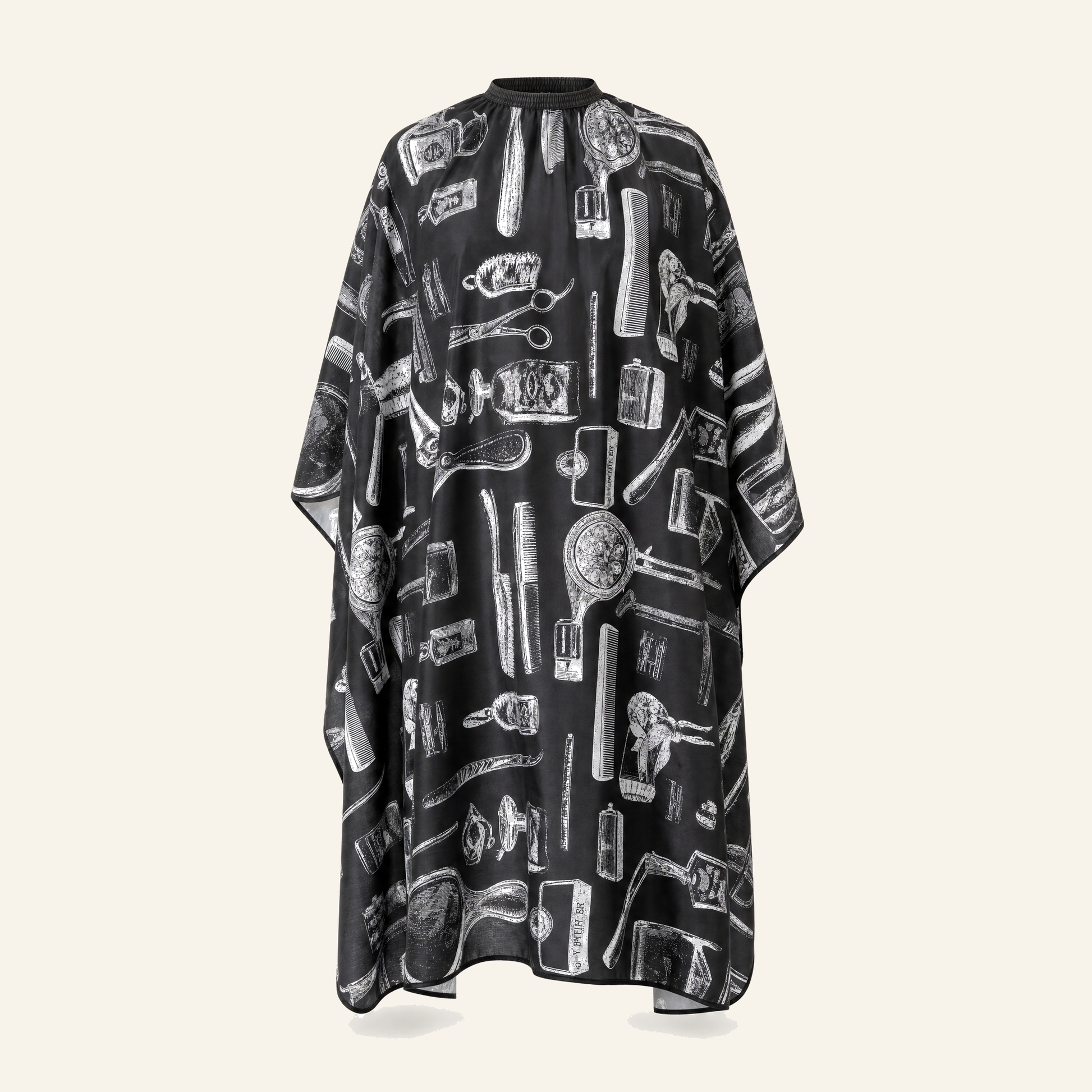 Friseurumhang New York Schwarz-Weiß Polyester - Produktfoto auf beigem Hintergrund