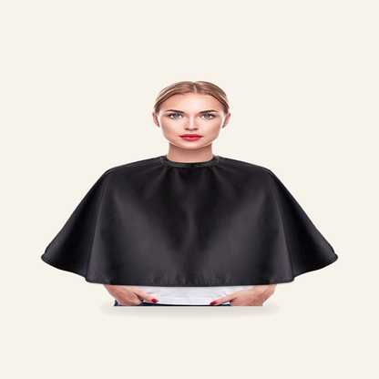Das praktische Tuch für Salon Friseur Umhang , Friseursalon oder Zuhause. - Produktfoto auf beigem Hintergrund